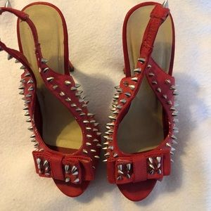 RED STUDDED HEELS